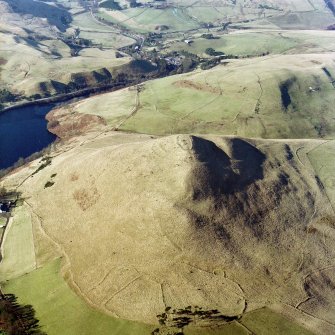 Oblique aerial view centred on the remains of the fort, taken from the SE.