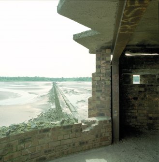 Edinburgh, Cramond Island, The Knoll battery and anti-shipping barrier.  Scanned image of view of anti-shipping barrier from the North end showing part of The Knoll battery constructed to defend the tidal area between Cramond and the Island.