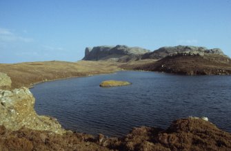 Copy of colour slide showing dun on Loch nam Ban Mora, Isle of Eigg.
Digital Image only.