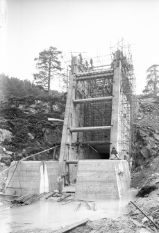 View of Mullardoch-Fasnakyle-Affric Project, contract no 10, Fasnakyle Tunnel. Concreting of intake structure.
Scan of glass negative no. 244, Box 1042/1