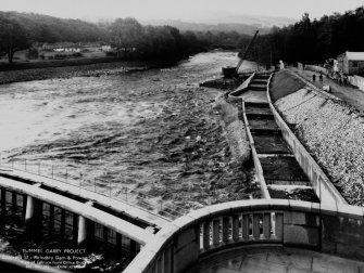 View of Tummel/Garry Project, contract 17, Pitlochry Dam and Power Station, view of tailrace from office block.
Scan of negative no. 102, Box 889/1