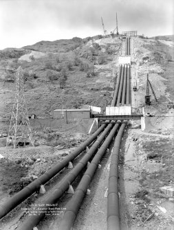Loch Sloy Project, Contract 13 - Exterior steel pipeline. View looking upwards to Valve House.
Scanned image of glass negative no. 17, Box 1115.