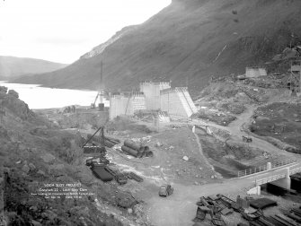 Loch Sloy Project, Contract 22- Loch Sloy Dam. View looking on downstream north face of dam.
Scanned image of negative no. 18, Box 883.