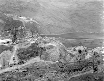 Loch Sloy Project, Contract 22- Loch Sloy Dam. View looking on downstream north face of dam.
Scanned image of glass negative no. 6, Box 883.