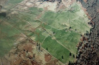 Oblique aerial view of ruined farmsteads on Carie farm, centred on former township of Margdow. Taken from SW.