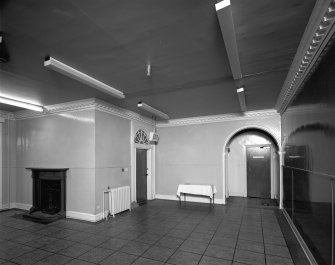 Interior.
Scanned image of view of entrance hall from South.