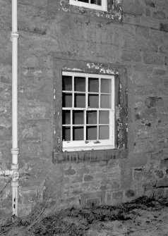 Scanned image of detail of window on East front.