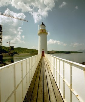 Skye, Eilean Ban, Kyleakin Lighthouse.
View from North-East along walkway towards lighthouse, showing wooden deck and iron parapets.