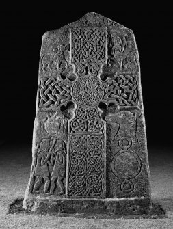 Scanned image of Pictish cross slab in manse garden, view of west (front) face (flash)
