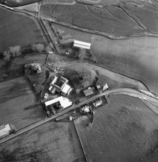 Scanned image of oblique aerial view centred on tower from W.