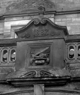 Montrave House, north elevation, detail of armorial panel and datestone, '1887', above porch.