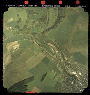 Vertical aerial view showing the N part of Galashiels and Torwoodlee House.  Also visible is the course of The Waverley Line.