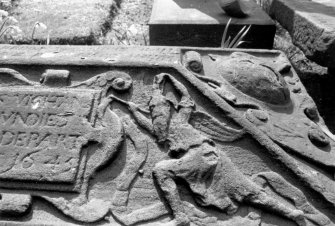 Scanned image of Dundee, Barrack Street, The Howff.
Detail of Vichtane coped tomb, 1645. A figure of Father time lunging forward with his scythe.