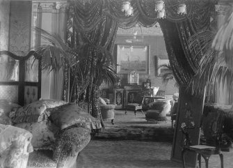 View of drawing room, furniture and possible bearskin rug looking through to the ante room, Montrave House, Fife.