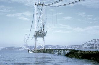 View north of south side span and main span from south shore. Suspender and deck erection in progress.
Copy of original 35mm colour transparency
Survey of Private Collection