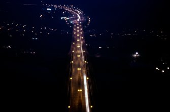 South side span, south viaduct and toll area at night. View looking south from top of South Main Tower.
Copy of original 35mm colour transparency.
Survey of Private Collection