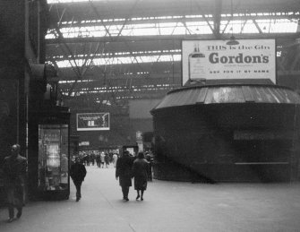 Scanned image of view of booking office and concourse.