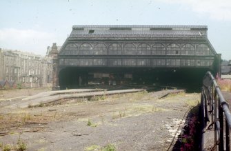 View from SW of derelict train shed and platforms.