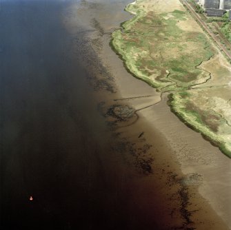 Oblique aerial view centred on the remains of the Dumbuck crannog, taken from the ESE.