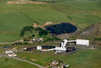 Copy of colour oblique aerial photograph showing the coal treatment plant.
Survey of Private Collection.