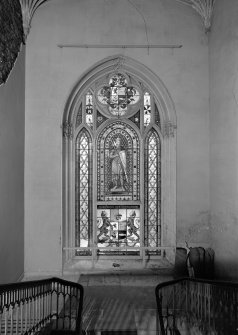 Skye, Armadale Castle, interior.
General view of staircase stained glass window. Quatrefoil arms above and armed figure and further coat of arms below.