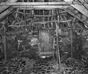 Beaton's Cottage, interior.  View of North end of byre from South.