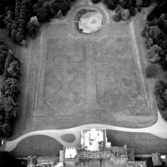 Oblique aerial view from E showing cropmarks of remains of late 17th-century parterre.