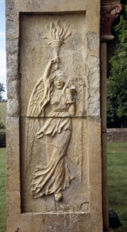 Detail of Art Nouveau relief showing angel with torch.