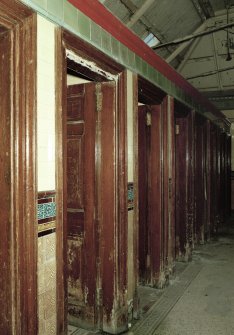 View of row of nine toilet cubicles from SE. Photosurvey 9-OCT-1991