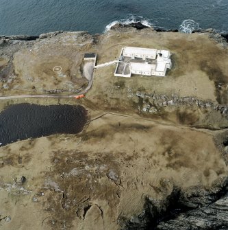 Oblique aerial view centred on Strathy Point lighthouse, taken from the E.