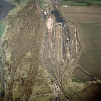 Oblique aerial view centred on the railway marshalling yard, taken from the SSE.