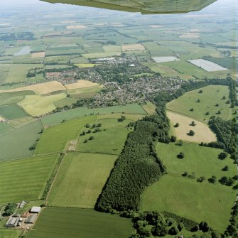 General oblique aerial view centred on the town, with the remains of the redoubt and  fort adjacent, taken from the N.