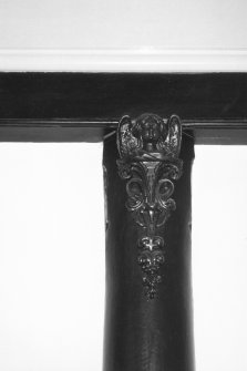 Detail of column with bust of winged angel.