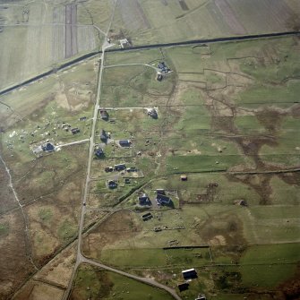 Oblique aerial view centred on the remains of the township, taken from the ESE.