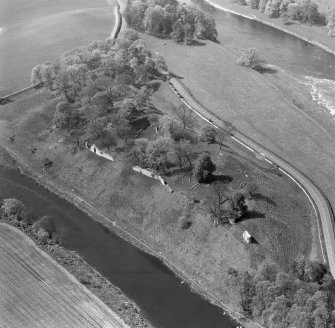 Oblique aerial view from NE showing the remains of Roxburgh Castle.