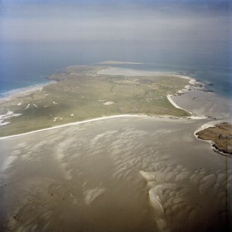 General olique aerial view looking across Eolaigearraidh towards the island of Fiariadh, taken from the SSE.