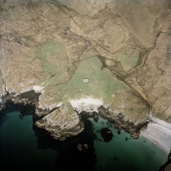 Oblique aerial view centred on the remains of the township, taken from the SE.