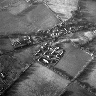 Oblique aerial view centred on village from E.