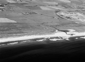 General oblique aerial view centred on Annachie Burn with the St Fergus Gas Terminal adjacent, looking to the WNW.