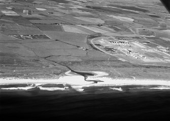 General oblique aerial view centred on Annachie Burn with the St Fergus Gas Terminal adjacent, looking to the W.