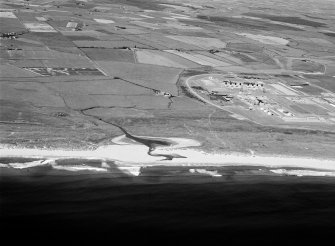 General oblique aerial view centred on Annachie Burn with the St Fergus Gas Terminal adjacent, looking to the WSW.