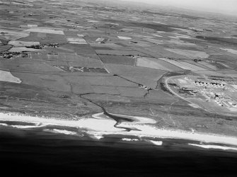 General oblique aerial view centred on Annachie Burn with the St Fergus Gas Terminal adjacent, looking to the WSW.