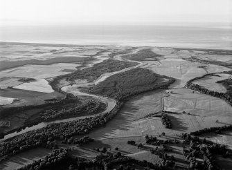 General oblique aerial view centred on the River Spey, looking to the N.