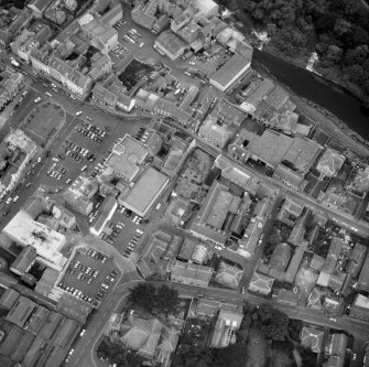 Oblique aerial view of excavations in Roxburgh Street.  Also visible is The Square, The Cross Keys Hotel and the Town Hall.