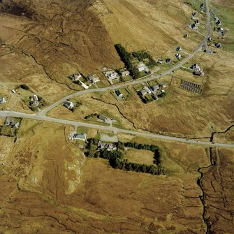Oblique aerial view centred on part of Leurbost crofting township, Lewis, taken from the WNW.
