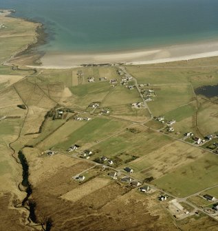 Oblique aerial view centred on the crofting township, taken from the NW.