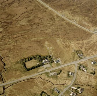 Oblique aerial view centred on part of the crofting township, taken from the SE.