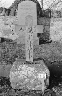 Digital copy of photograph of cross with rose carving.  Inscription completely eroded.
Survey no. 19
