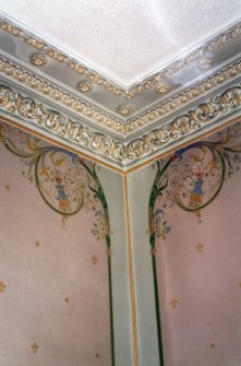 Detail of cornice and wall painting.