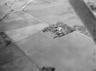 Oblique aerial view centred on Muchalls Castle, looking to the NW.